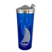 Load image into Gallery viewer, Full view of 1930s cobalt blue glass cocktail shaker showing sailboat pattern and chrome top