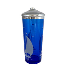 Load image into Gallery viewer, Rear view of 1930s Hazel-Atlas cobalt blue glass cocktail shaker showing white enamel sailboats and seabirds decoration, Art Deco design