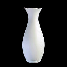 Load image into Gallery viewer, Vintage white bisque porcelain flower vase features an embossed queen of flowers, pattern 631. Designed by M. Frey for Kaiser, Germany, 1970s. This delicate vase will look stunning in any setting!
In excellent condition, no chips/cracks/repairs. Maker's mark on bottom.
Measures 3 1/2 x 6 1/2 inches