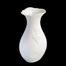 Load image into Gallery viewer, Vintage white bisque porcelain flower vase features an embossed queen of flowers, pattern 631. Designed by M. Frey for Kaiser, Germany, 1970s. This delicate vase will look stunning in any setting!
In excellent condition, no chips/cracks/repairs. Maker's mark on bottom.
Measures 3 1/2 x 6 1/2 inches