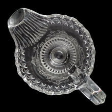 Load image into Gallery viewer, Overhead view of antique Adams & Co. EAPG Wildflower #140 footed creamer pitcher showing the open spout, interior glass clarity, and pressed pattern around the rim, c.1880