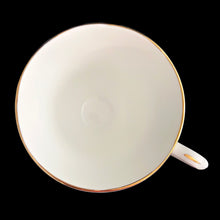 Load image into Gallery viewer, Vintage Woodside white bone china teacup and saucer features purple violets, trimmed in gold gilt. Crafted by Duchess, England, 1960s. A lovely way to enjoy a cuppa tea!
In excellent condition, no chips, cracks or repairs. Maker's mark on the bottom.
Measures 3 7/8 x 2 3/4 x 5 1/2 inches