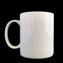 Load image into Gallery viewer, Vintage white ceramic mug featuring an artisan designed and hand painted dimensionally (puffy) illustrated yellow cat set against an orange and red background, outlined in black with an inscription on the interior that reads "...Meow!". Crafted by Ketto Design, Canada, circa 1998. This Quebec company no longer produces these mugs making them hard to find and highly collectible. In excellent used condition, free from chips/cracks/repairs. Measures 3 1/8 x 3 3/4 inches Capacity 8 ounces