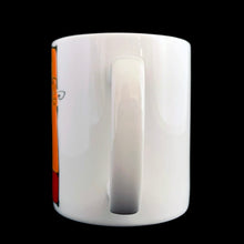 Load image into Gallery viewer, Vintage white ceramic mug featuring an artisan designed and hand painted dimensionally (puffy) illustrated yellow cat set against an orange and red background, outlined in black with an inscription on the interior that reads "...Meow!". Crafted by Ketto Design, Canada, circa 1998. This Quebec company no longer produces these mugs making them hard to find and highly collectible. In excellent used condition, free from chips/cracks/repairs. Measures 3 1/8 x 3 3/4 inches Capacity 8 ounces