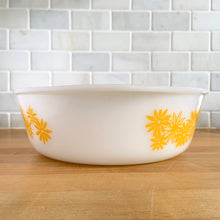Load image into Gallery viewer, Vintage Glasbake milk glass round lidded 3 quart casserole dish featuring the "Daisy Days" pattern in yellow, with a clear lid. Manufactured either by the McKee or Jeannette Glass Company in the USA, circa 1960s Perfect for storing, serving, and cooking!