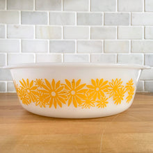 Load image into Gallery viewer, Vintage Glasbake milk glass round lidded 3 quart casserole dish featuring the "Daisy Days" pattern in yellow, with a clear lid. Manufactured either by the McKee or Jeannette Glass Company in the USA, circa 1960s Perfect for storing, serving, and cooking!