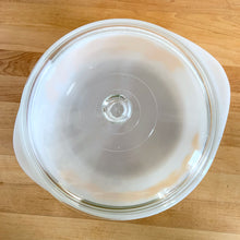 Load image into Gallery viewer, Vintage Glasbake milk glass round lidded 3 quart casserole dish featuring the "Daisy Days" pattern in yellow, with a clear lid. Manufactured either by the McKee or Jeannette Glass Company in the USA, circa 1960s Perfect for storing, serving, and cooking!