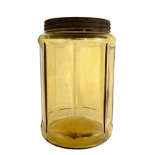 Load image into Gallery viewer, Antique eight sided yellow depression glass metal lidded tobacco canister. Early 1900s. Perfect for dry goods storage.
In vintage condition, significant wear to the lid with rust and tiny hole. Typical bubbles and stringers in the glass.
Measures 4 1/2 x 7 inches