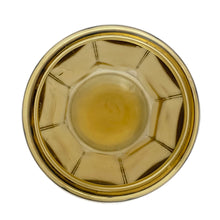 Load image into Gallery viewer, Antique eight sided yellow depression glass metal lidded tobacco canister. Early 1900s. Perfect for dry goods storage.
In vintage condition, significant wear to the lid with rust and tiny hole. Typical bubbles and stringers in the glass.
Measures 4 1/2 x 7 inches