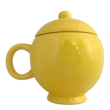 Load image into Gallery viewer, Bring on the happy with this vintage bright yellow smiley face lidded mug. Novelty gift crafted by Teleflora Gift, China, 1970s. In excellent condition, no chips/cracks/repairs. Minor manufacturers defect at the mug rim, see photos. Measures 4 1/4 x 6 inches. Capacity 20 ounces