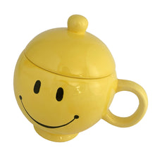 Load image into Gallery viewer, Bring on the happy with this vintage bright yellow smiley face lidded mug. Novelty gift crafted by Teleflora Gift, China, 1970s. In excellent condition, no chips/cracks/repairs. Minor manufacturers defect at the mug rim, see photos. Measures 4 1/4 x 6 inches. Capacity 20 ounces