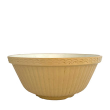 Load image into Gallery viewer, Vintage yellow ware mixing bowl with vertical ribbed pattern and decorative rim. Crafted by Mason Cash, 1950s. A well-crafted piece of stoneware offering a nostalgic vibe to your farmhouse or cottage kitchenware and decor!
In excellent condition, no chips/cracks/repairs. Marked Made in England.
Measures 10 3/8 x 4 1/2 inches