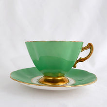 Load image into Gallery viewer, Vintage "3302-25" rose and floral bouquet, green w/ gold trim bone china teacup and saucer, Hammersley & Co., England, between 1932 to 1970. In excellent condition, free from chips, cracks and repairs. Measures 3-3/4" x 2-3/4"