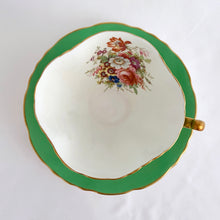Load image into Gallery viewer, Vintage "3302-25" rose and floral bouquet, green w/ gold trim bone china teacup and saucer, Hammersley & Co., England, between 1932 to 1970. In excellent condition, free from chips, cracks and repairs. Measures 3-3/4" x 2-3/4"