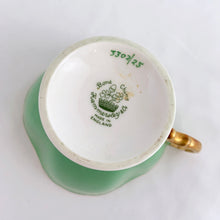 Load image into Gallery viewer, Vintage "3302-25" rose and floral bouquet, green w/ gold trim bone china teacup and saucer, Hammersley & Co., England, between 1932 to 1970. In excellent condition, free from chips, cracks and repairs. Measures 3-3/4" x 2-3/4"
