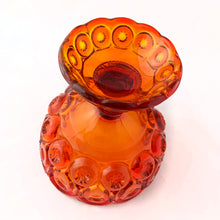 Load image into Gallery viewer, Gorgeous vintage pressed glass amberina Moon and Stars pedestal lidded compote or candy dish. Crafted by the LE Smith Glass Company between 1940s – 2004. This beauty glows brilliantly under black light. This classic candy dish will make a fabulous addition to your glass collection.
In as found vintage condition. The compote is in excellent condition, no chips. The lid has chipping at the rim in several places, see photos.
Measures 6 3/8 x 10 inches