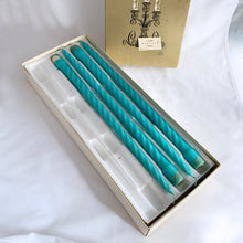 Load image into Gallery viewer, Elegant vintage mid-century 15 inch turquoise Baroque Slim Twist (wax) Candles. The box notes these as "another PARAGON® creation. Produced by Victrylite Candle Co., USA, circa 1950s/1960s. You'll find this phrase printed on each side of the box, "light your evenings with loveliness..." and they are correct! In excellent vintage condition with wicks intact in original box. Measures 15 inches