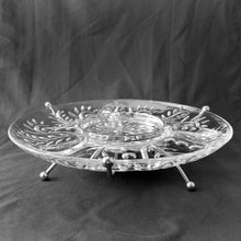 Load image into Gallery viewer, A great mid-century modern "2875 Clear" divided pressed glass relish tray featuring a botanical dot and leaf design, perched atop an atomic style chrome lazy susan stand. Perfect for serving crudités with your favourite dip or an assortment of pickles, olives and pearl onions. In excellent condition, no chips or cracks. May be used with or without the lazy susan. Measures 11 1/2 x 2 1/2 inches (incl. stand)