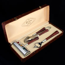 Load image into Gallery viewer, Three-piece set of mid-century vintage Barmates stop light cocktail bar tool accessories. Presented in original satin lined box and the tools look brand new. Set includes red Danger, yellow Caution and green Go handled 3 oz. jigger, ice tongs and opener. Each piece has a gorgeous dark amber bakelite handle and the chrome on each piece is magnificent. Produced by Glo-Hill of Canada, circa 1950. A truly stunning bar tool set! In excellent condition. Box measures 12 3/8 long by 4 3/4 wide by 2 1/4 high.