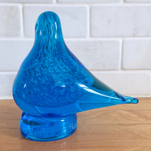 Load image into Gallery viewer, Delightful hand blown two-toned blue art glass bird paperweight with controlled bubbles. Produced by Altaglass of Medicine Hat Canada, 1979. In excellent condition, free from chips/cracks/damage. Maker's marks on the bottom. Measures 2 1/4 x 4 5/8 x 4 inches