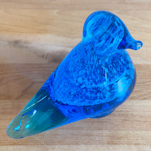 Load image into Gallery viewer, Delightful hand blown two-toned blue art glass bird paperweight with controlled bubbles. Produced by Altaglass of Medicine Hat Canada, 1979. In excellent condition, free from chips/cracks/damage. Maker's marks on the bottom. Measures 2 1/4 x 4 5/8 x 4 inches