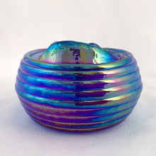 Load image into Gallery viewer, Vintage iridescent blue carnival glass Christmas ornament with house scene on one side and "Home for the Holidays 1990" on the other. The sides have a ribbed detail. A beautiful piece of mold blown glass with an applied blown glass hanger. It's absolutely stunning!  In excellent condition, no chips or cracks. Maker unknown.  Measures 3-1/4" x 1-3/4"