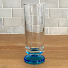 Load image into Gallery viewer, A recent treasure hunt uncovered this stunning set of eight (8) mid-century Italian-made parfait glasses (circa 1950-60). The blue is reminiscent of the Mediterranean Sea with its azure coloured water. Imagine eating a scrumptious tiramisu from these lovelies at a seaside café. They are simply stunning! All are in excellent vintage condition, no chips or cracks. Marked "Italy". Size: 2.25" x 6"