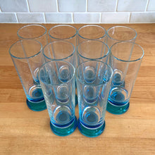 Load image into Gallery viewer, A recent treasure hunt uncovered this stunning set of eight (8) mid-century Italian-made parfait glasses (circa 1950-60). The blue is reminiscent of the Mediterranean Sea with its azure coloured water. Imagine eating a scrumptious tiramisu from these lovelies at a seaside café. They are simply stunning! All are in excellent vintage condition, no chips or cracks. Marked "Italy". Size: 2.25" x 6"
