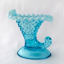 Load image into Gallery viewer, Vintage blue opalescent hobnail cornucopia candle holder or vase with crimped edge. Crafted by Fenton Art Glass, USA, 1940 - 1954 and 1959 - 1965. A lovely piece to add to your decor.
In excellent condition, no chips. Umarked.
Measures 5 1/4 x 5 x 5 1/2 inches