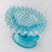 Load image into Gallery viewer, Vintage blue opalescent hobnail cornucopia candle holder or vase with crimped edge. Crafted by Fenton Art Glass, USA, 1940 - 1954 and 1959 - 1965. A lovely piece to add to your decor.
In excellent condition, no chips. Umarked.
Measures 5 1/4 x 5 x 5 1/2 inches