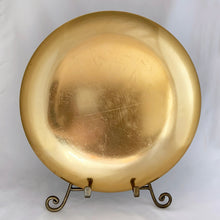 Load image into Gallery viewer, Base view of a vintage 1950s mid-century mosaic tile dish displayed on a brass easel stand, showing circular shape with a gold back
