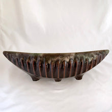Load image into Gallery viewer, A fantastic large oblong gondola shaped footed pottery planter in brown drip glaze with vertical rib details. Produced by Beaceware, Canada. This unusual 1960s vintage planter would be a beautiful vessel for your favourite houseplants or succulents or use it as a console bowl or catchall. Whatever you choose, it will make a wonderful decorative piece. In excellent condition, free from chips or cracks. Marked "BEAUCE 1756 CANADA" Measures 13 5/8 x 5 1/4 x 4 inches