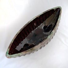 Load image into Gallery viewer, A fantastic large oblong gondola shaped footed pottery planter in brown drip glaze with vertical rib details. Produced by Beaceware, Canada. This unusual 1960s vintage planter would be a beautiful vessel for your favourite houseplants or succulents or use it as a console bowl or catchall. Whatever you choose, it will make a wonderful decorative piece. In excellent condition, free from chips or cracks. Marked "BEAUCE 1756 CANADA" Measures 13 5/8 x 5 1/4 x 4 inches