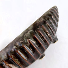 Load image into Gallery viewer, A fantastic large oblong gondola shaped footed pottery planter in brown drip glaze with vertical rib details. Produced by Beaceware, Canada. This unusual 1960s vintage planter would be a beautiful vessel for your favourite houseplants or succulents or use it as a console bowl or catchall. Whatever you choose, it will make a wonderful decorative piece. In excellent condition, free from chips or cracks. Marked "BEAUCE 1756 CANADA" Measures 13 5/8 x 5 1/4 x 4 inches