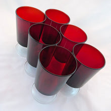 Load image into Gallery viewer, This beautiful set of six (6) vintage "Cavalier Ruby" water goblet glasses are a luscious deep ruby red with clear footed crystal stems. Made by Cristal D'Arques-Durand, France. Circa 1970 (discontinued). These are great for water and wine or use to dessert parfaits. Each glass is in excellent condition, no chips or cracks. Marked "France" on the bottom. Size: 3" x 5-1/8" (8oz)