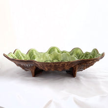 Load image into Gallery viewer, Vintage mid-century figural ceramic green clamshell chip and dip bowl. Crafted by Treasure Craft, USA, circa 1950s. Perfect for entertaining with an nautical or tiki theme!
In very good vintage condition with minor chip to the foot (see photos).
Measures approximately 12 1/2 x 11 x 5 inches