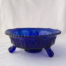 Load image into Gallery viewer, Gorgeous antique Butterfly and Berries cobalt blue pressed glass paneled tri-footed bowl, featuring butterflies and berries on the vine. Crafted by Fenton Art Glass, 1920s. Makes a lovely fruit bowl, catchall or decor piece.
In excellent condition, no chips.
Measures 9 1/4 x 3 3/4 inches