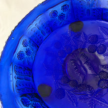 Load image into Gallery viewer, Gorgeous antique Butterfly and Berries cobalt blue pressed glass paneled tri-footed bowl, featuring butterflies and berries on the vine. Crafted by Fenton Art Glass, 1920s. Makes a lovely fruit bowl, catchall or decor piece.
In excellent condition, no chips.
Measures 9 1/4 x 3 3/4 inches