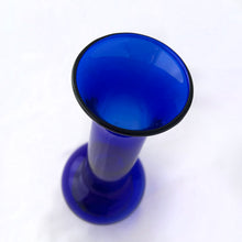 Load image into Gallery viewer, A beautiful hand blown cobalt blue bulb-shaped bud vase, ideal for single stems or a small bouquet. Made in the USA, circa 1970s. In excellent condition, no chips or cracks. Measures 3 x 7 1/2 inches