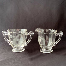 Load image into Gallery viewer, Vintage Creamer Sugar Cut Etched WJ Hughes Central Glass Works Cornflower Corn Flower Glass Pattern 12 twelve petalled flowers leaf sprays wings winged handles tea coffee dessert luncheon wedding elegant dinner glassware tableware scalloped feminine edge footed Home Decor Boho Bohemian Shabby Chic Cottage Farmhouse Mid-Century Modern Industrial Retro Flea Market Style Unique Sustainable Gift Antique Prop GTA Hamilton Toronto Canada shop store community seller reseller vendor