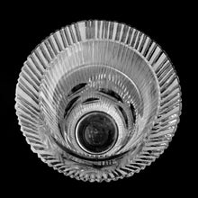 Load image into Gallery viewer, vintage modernist style twenty-four percent lead crystal vase cut in vertical ridges with a band of varying sized circles. The cut circles create an interesting kaleidoscope-like effect. A brilliant piece of art glass designed and executed by artist Josef Pravec, produced for Crystal BOHEMIA in Podebrady, Czechoslovakia, circa 1974. In excellent condition, free from chips, cracks or damage. Signed by the artist on the bottom. Measures 4-5/8" x 13"