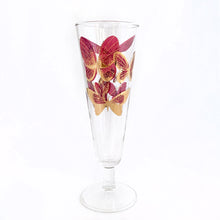Load image into Gallery viewer, Sip in style with these stunning vintage mid-century era Fred Press footed pilsner glasses decorated in 22kt gold and cranberry pink butterflies on clear Federal Glass blanks, USA, 1950s. Perfect for a cold beer, bubbly champagne or your favourite cocktail or mocktail. These are sure to add a retro glam vibe to your barware!
In excellent condition, no chips.
Measures 2 7/8 x 8 3/8 inches
Capacity 10 ounces