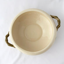 Load image into Gallery viewer, Vintage Desert Rose covered vegetable dish. The cream coloured dish features hand painted pink and green florals with brown branch handles and a pink rose finial on the lid. Crafted by Franciscan, England, 1985 - 2003. Highly collectible and beautiful!
In excellent vintage condition, no chips/cracks/repairs. One handle has tiny spot of glaze loss, see photos. Maker's marks.
Measures 6 3/4 x 4 1/4 inches