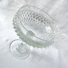 Load image into Gallery viewer, Vintage Diamond Point clear glass compote. Crafted by Indiana Glass, USA, 1970 - 1990. Easily add sparkly elegance to your table or decor with this versatile compote dish. This compote is perfect as a candy bowl, vanity decor or as a catchall.
In excellent condition, no chips.
Measures 6 1/4 x 7 1/8 inches