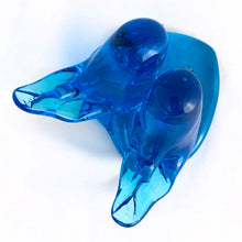 Load image into Gallery viewer, This lovely hand blown azure blue art glass pair of bluebirds perched on a heart was created by artisan Leo Ward in 1992. Mr. Ward was the creator of Arkansas' Bluebird of Happiness and owner of Terra Studios in Arkansas. He passed away at 89 years young in 2017. This piece is in excellent condition, free from chips or cracks. Measures 4" x 4" x 2-1/2"