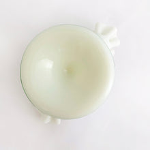 Load image into Gallery viewer, Gorgeous vintage milk glass fan-shaped vase, hand painted with violets in purple and green with crimped edge. Crafted by Fenton Art Glass, 1960s. A lovely way to display your flowers.
In excellent condition, no chips. Unmarked.
Measure 5 3/4 x 2 3/4 x 6 inches