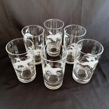 Load image into Gallery viewer, We are addicted to mid century style glasses and these highball cocktail glasses feature etched frosted ducks in flight! Crafted by the Libbey Glass Company, USA, circa 1950s. These glasses will look fabulous on a bar cart and even better in your guests' hands saying "cheers"! Measures 2 1/2 x 4 3/4 inches Capacity 8 ounces