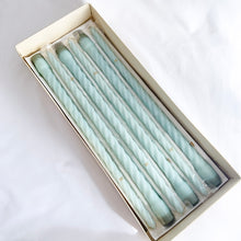 Load image into Gallery viewer, Elegant vintage mid-century 15 inch French blue Baroque Slim Twist (wax) Candles. The box notes these as "another PARAGON® creation. Produced by Victrylite Candle Co., USA, circa 1950s/1960s. You'll find this phrase printed on each side of the box, "light your evenings with loveliness..." and they are correct! In excellent vintage condition with wicks intact in original box. Measures 15 inches