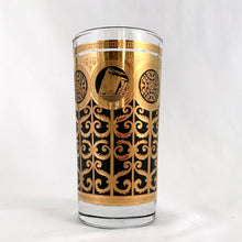 Load image into Gallery viewer, Vintage "Rock of Gibraltar" highball cocktail glass in 24K gold over matte black. Designed by artist Fred Press and produced on Libbey Glass Company blanks, circa 1950s. A stunning addition to your barware collection. In excellent condition, no chips or cracks. Measures 2 3/4 x 5 1/2 inches Capacity 16oz