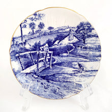Load image into Gallery viewer, Rare vintage Glorious Devon bone china demitasse cup and saucer features a blue pastoral landscape on white with scalloped shape and gold trim. Crafted by Shelley, England, 1940 - 1966. A charming addition to your china collection!
In excellent condition, no chips. Marked on the bottom with backstamp and the number 12734.
Cup 3 x 1 7/8 inches
Saucer 4 5/8 inches